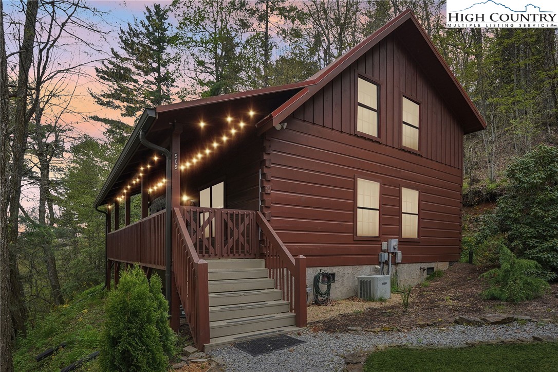 909 Niley Cook Road Blowing Rock, NC 28605 - Photo 44 of 45 a view of a house with a yard