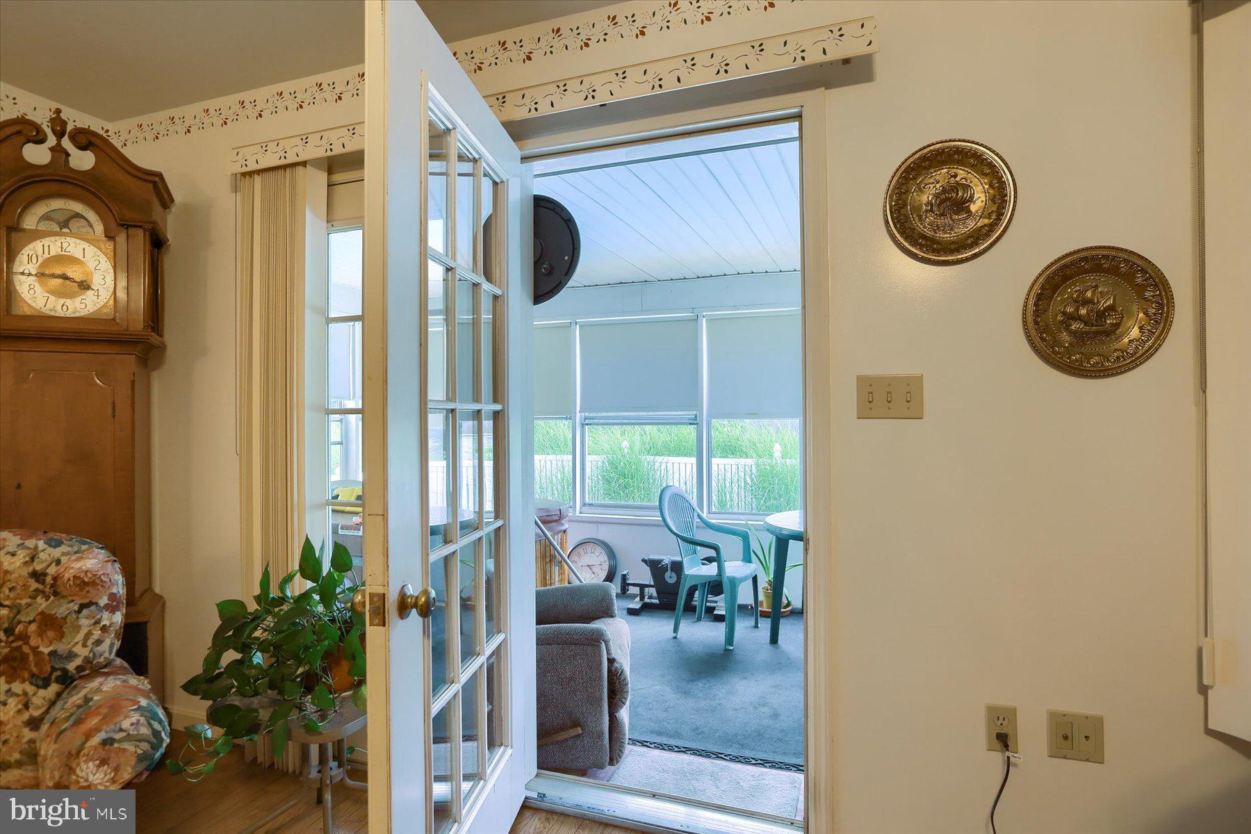 1612 Silver Spring Road Landisville, PA 17538 - Photo 20 of 55 Living Room Leads to Sunroom
