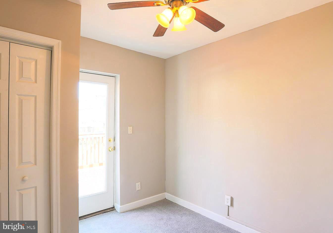 1114 West Cross Street Baltimore, MD 21230 - Photo 15 of 18 Den/3rd bedroom, with door to back porch.