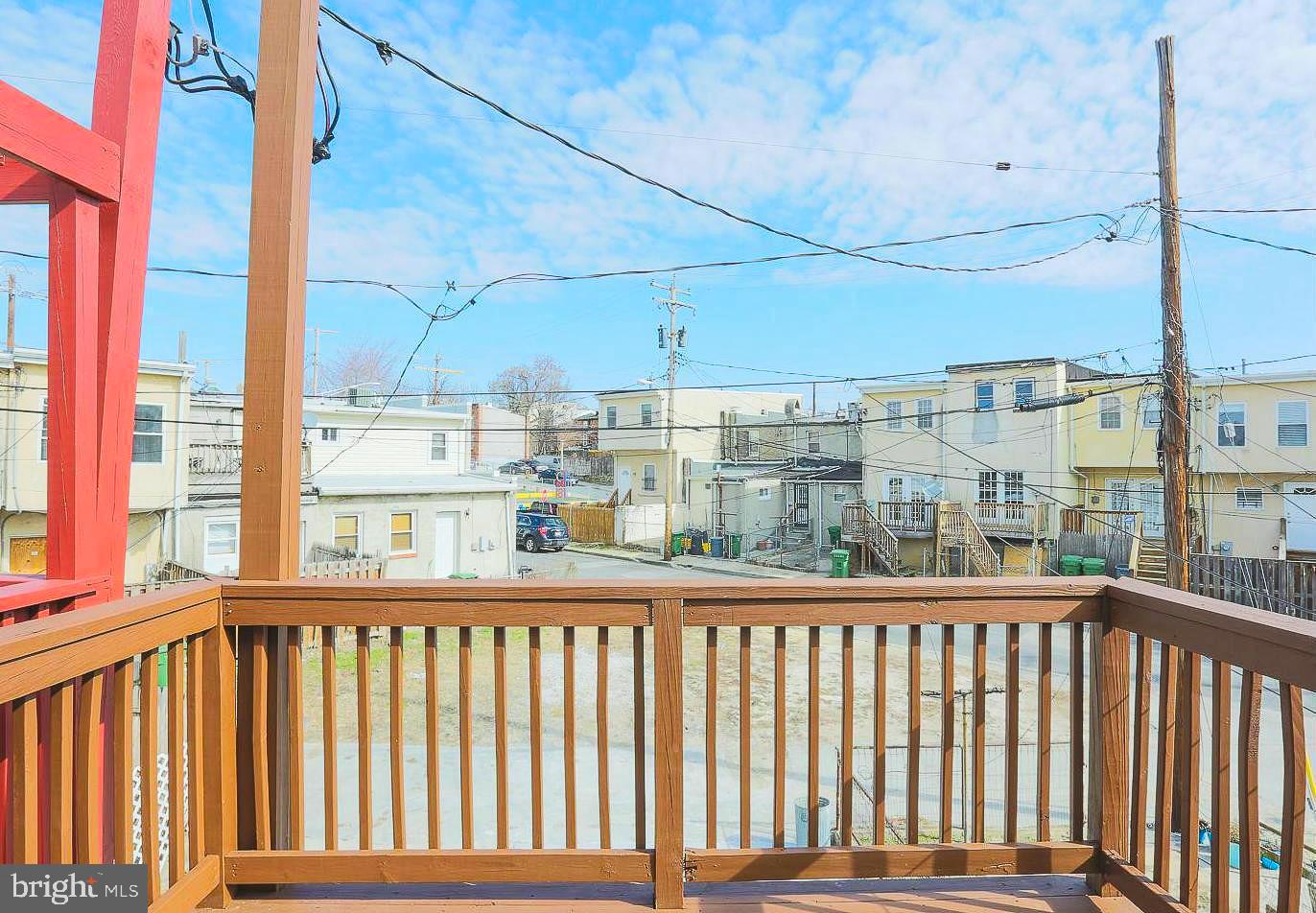 1114 West Cross Street Baltimore, MD 21230 - Photo 17 of 18 Back deck off den/3rd bedroom
