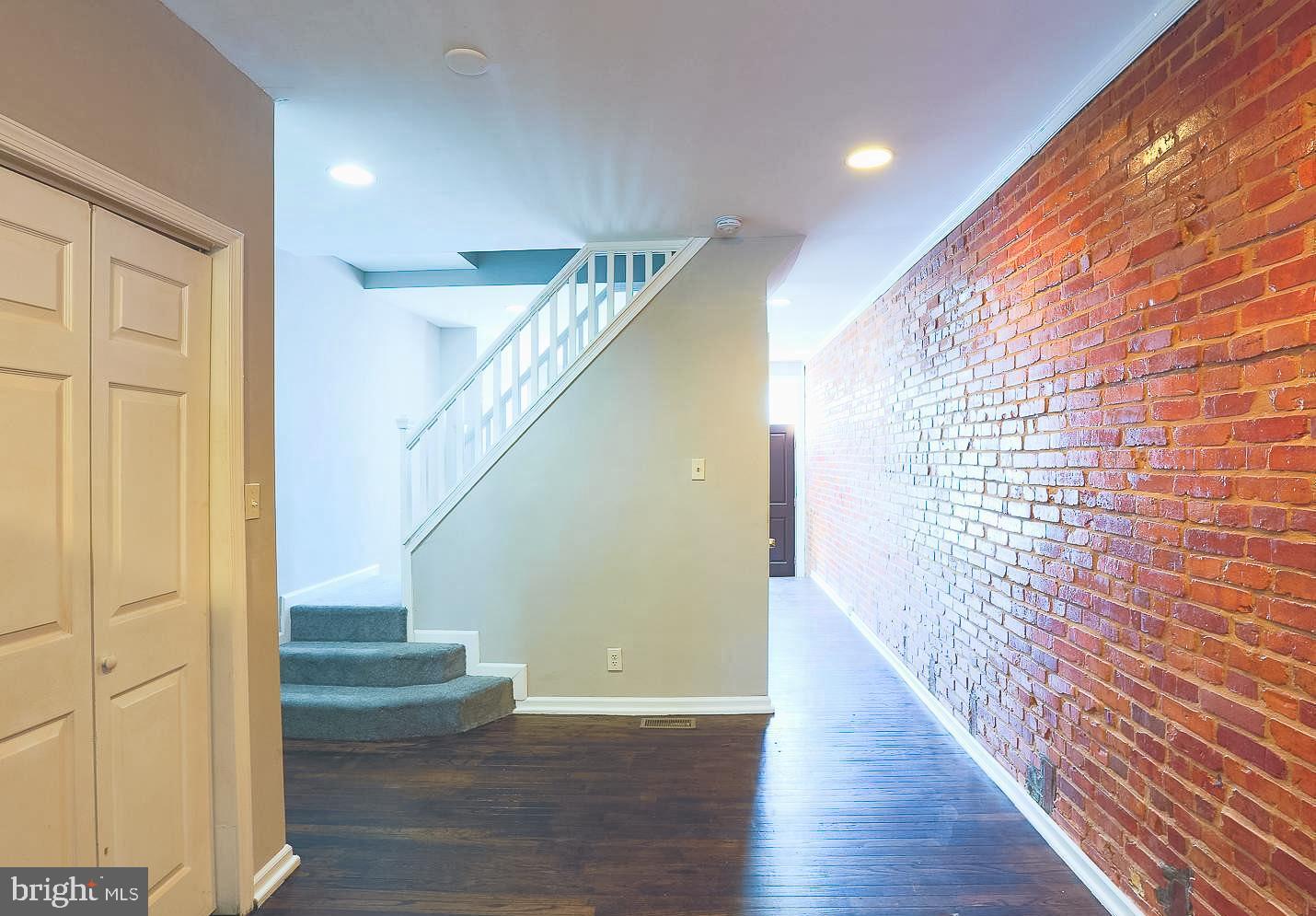 1114 West Cross Street Baltimore, MD 21230 - Photo 4 of 19 a view of entryway with wooden floor