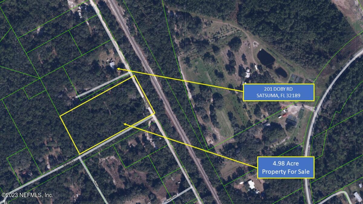 0 Doby Road Satsuma, FL 32189 - Photo 4 of 4 a sign that is on the wall