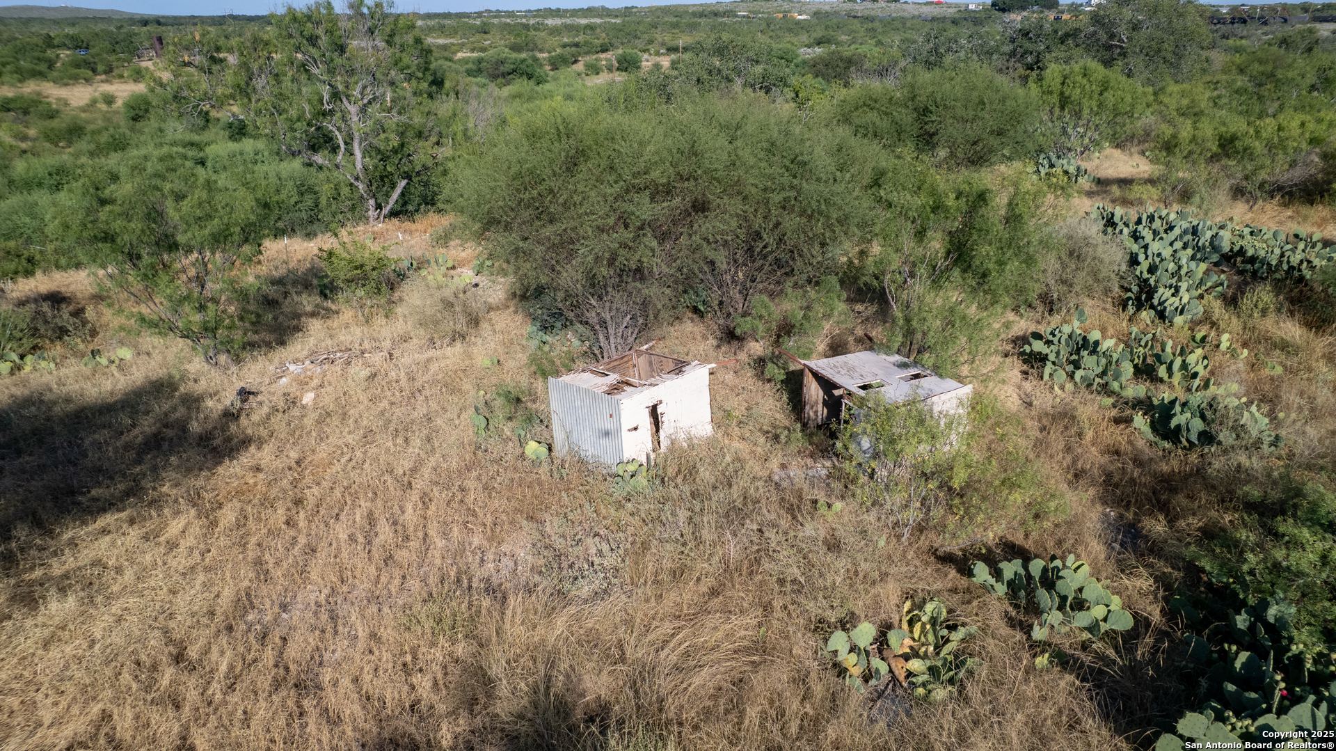 Tbd Tbd Camp Uvalde, TX 78801 - Photo 19 of 25 an aerial view of a house with a yard