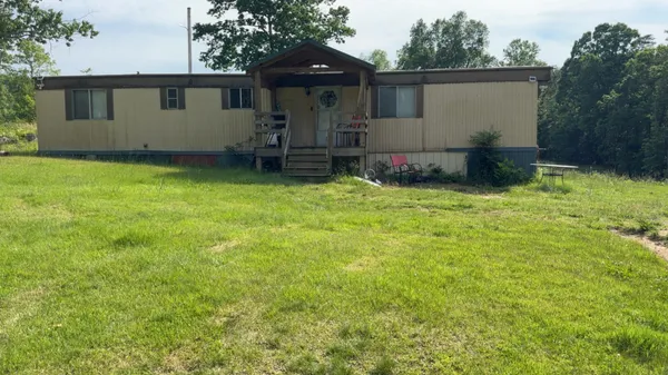 a front view of house with yard