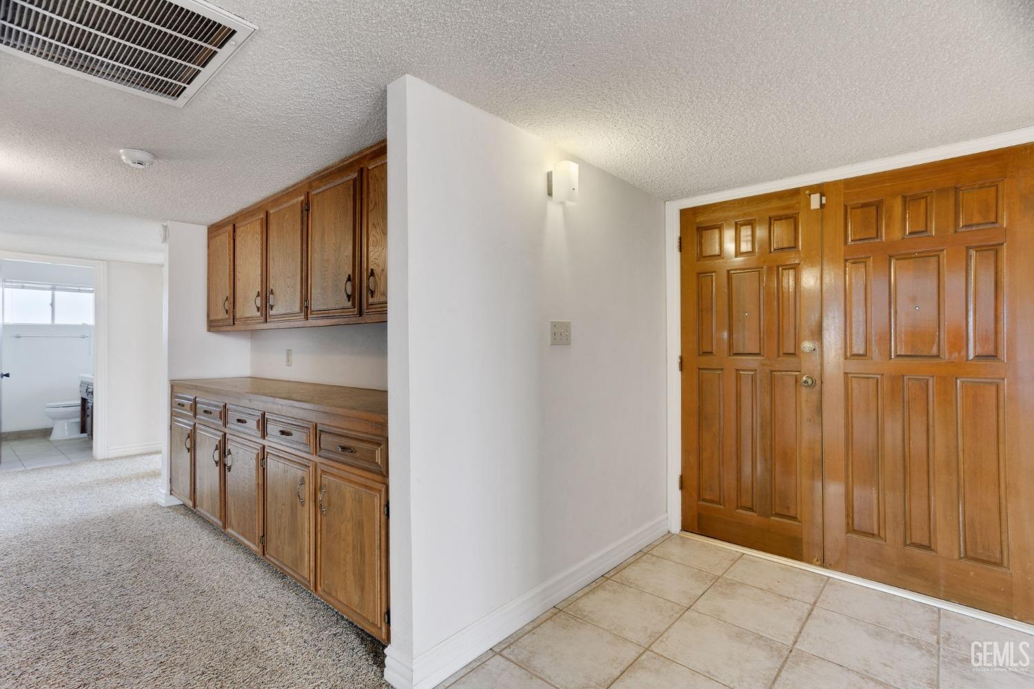 Undisclosed Address Bakersfield, CA 93306 - Photo 11 of 51 a view of a kitchen with electric appliances