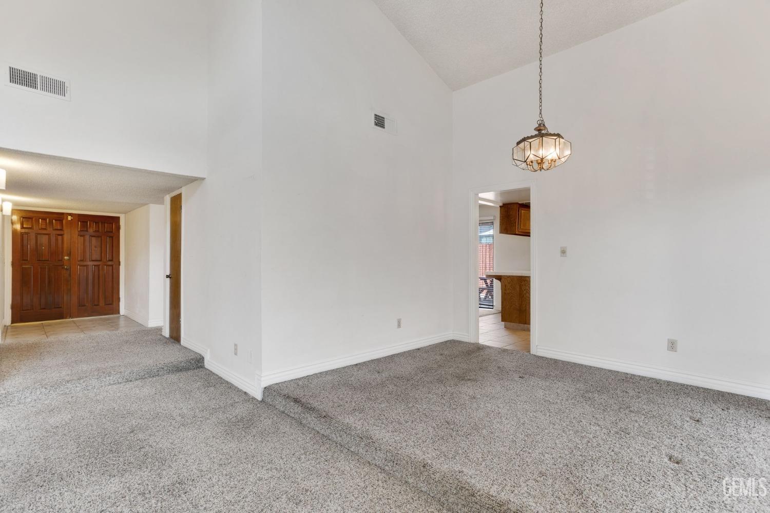 Undisclosed Address Bakersfield, CA 93306 - Photo 18 of 51 a view of empty room with windows