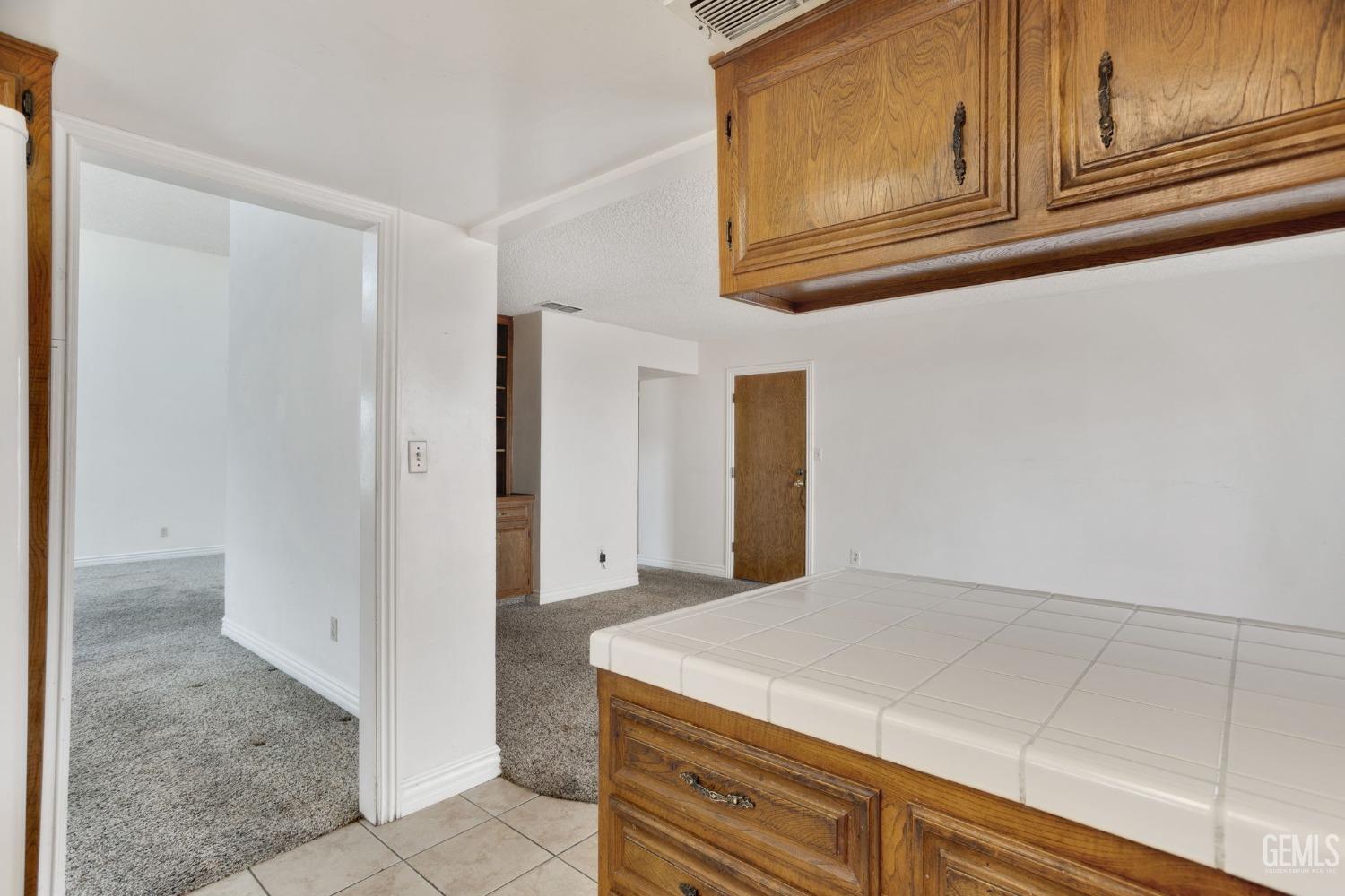 Undisclosed Address Bakersfield, CA 93306 - Photo 30 of 51 a bathroom with a sink and a mirror