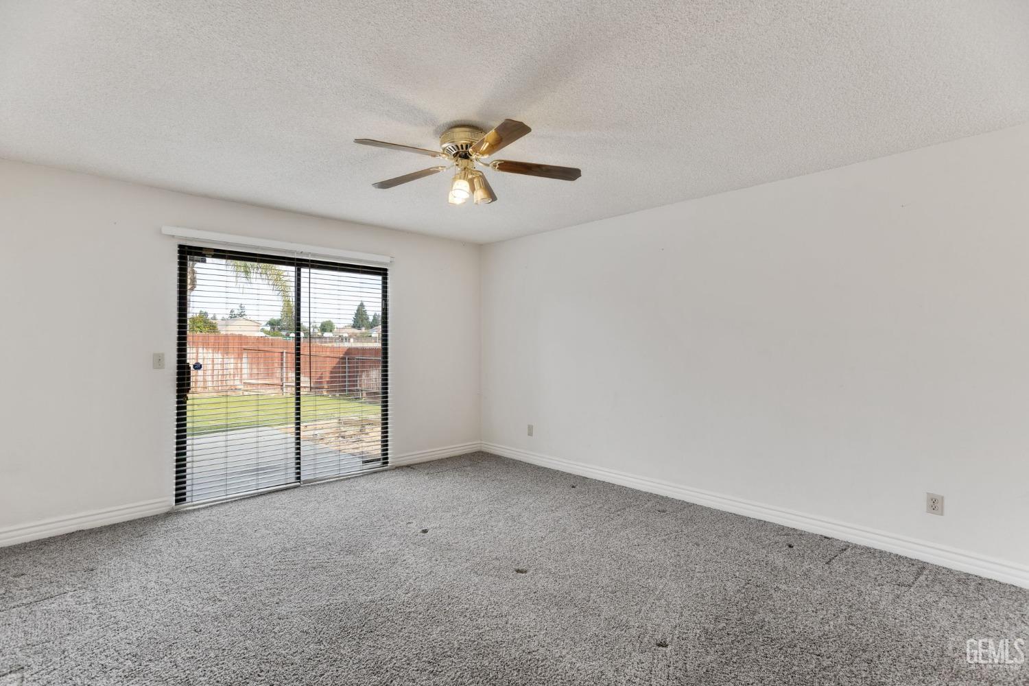 Undisclosed Address Bakersfield, CA 93306 - Photo 32 of 51 an empty room with windows