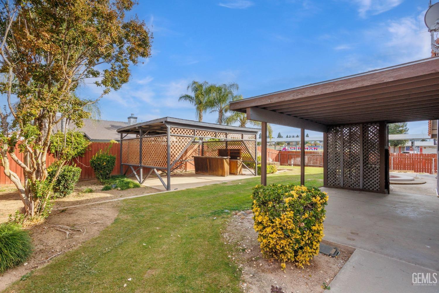 Undisclosed Address Bakersfield, CA 93306 - Photo 43 of 51 a view of a backyard