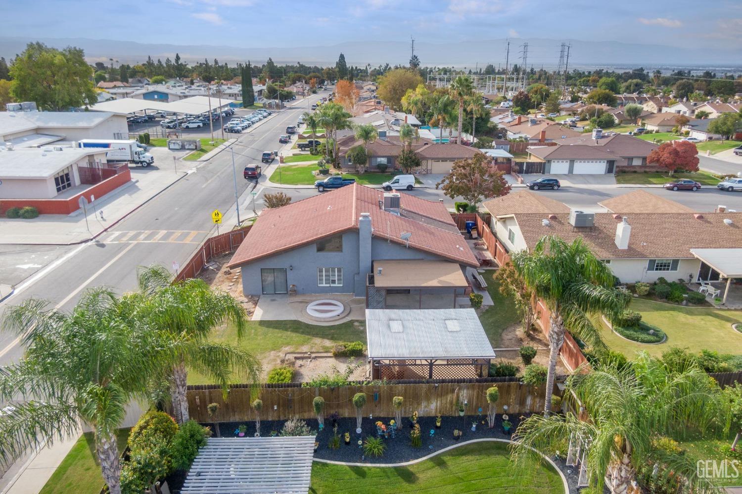 Undisclosed Address Bakersfield, CA 93306 - Photo 49 of 51 an aerial view of a house with a garden