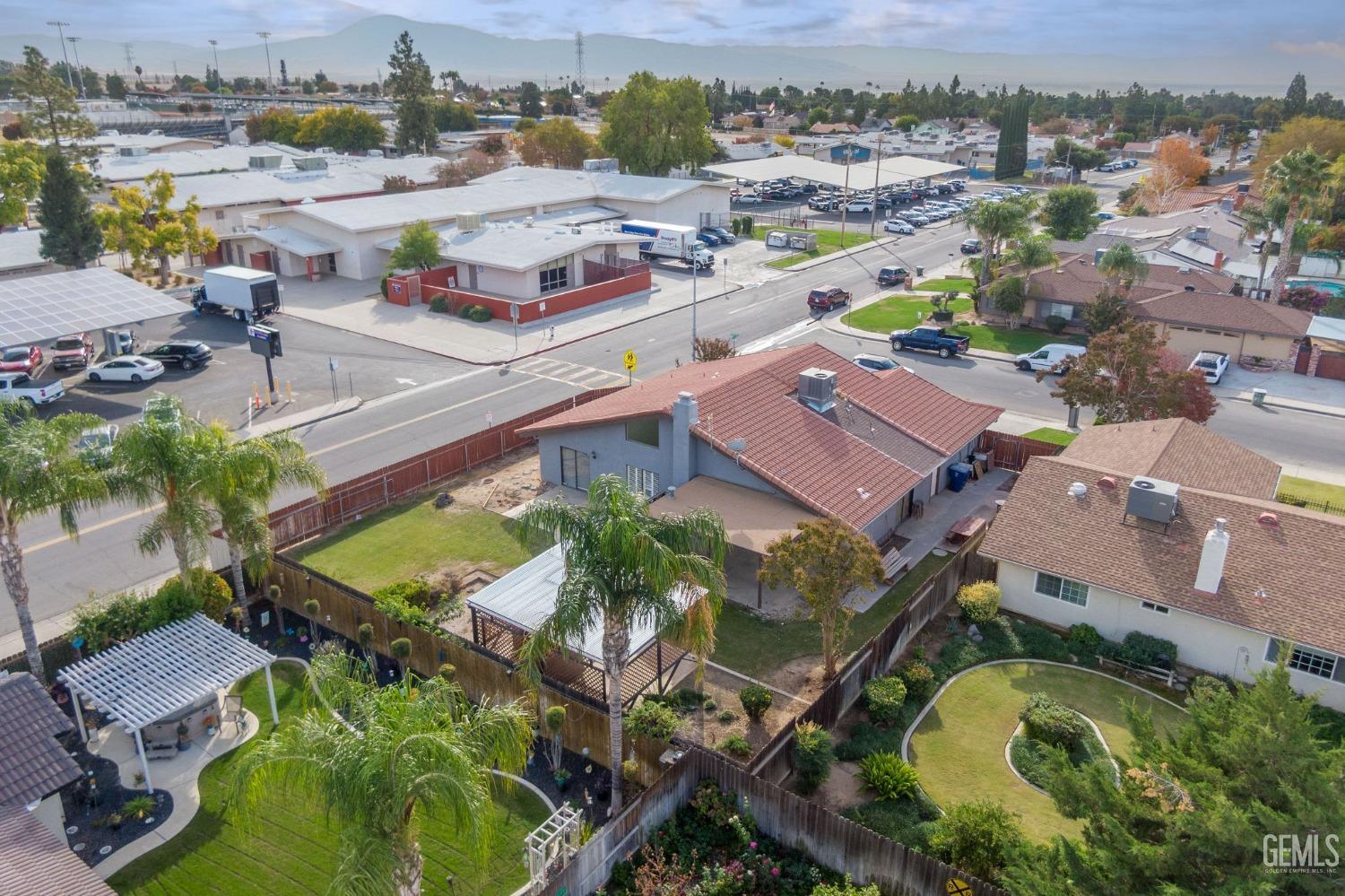 Undisclosed Address Bakersfield, CA 93306 - Photo 50 of 51 an aerial view of residential houses with outdoor space and swimming pool