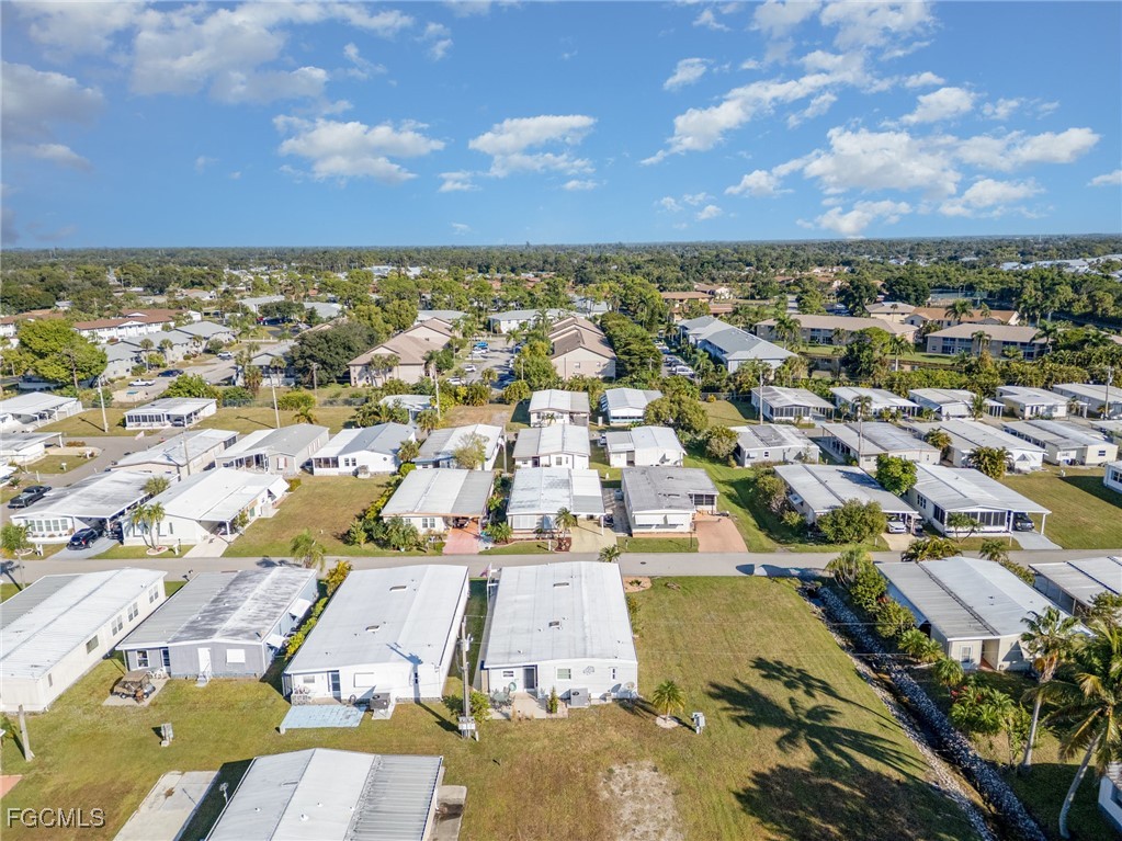 5508 Colonial Road North Fort Myers, FL 33917 - Photo 26 of 31 an aerial view of residential houses with outdoor space