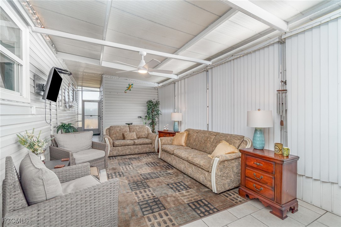 5508 Colonial Road North Fort Myers, FL 33917 - Photo 4 of 31 a living room with furniture and a couch