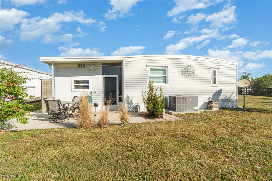 5508 Colonial Road North Fort Myers, FL 33917 - Photo 6 of 31 a view of a house with a patio