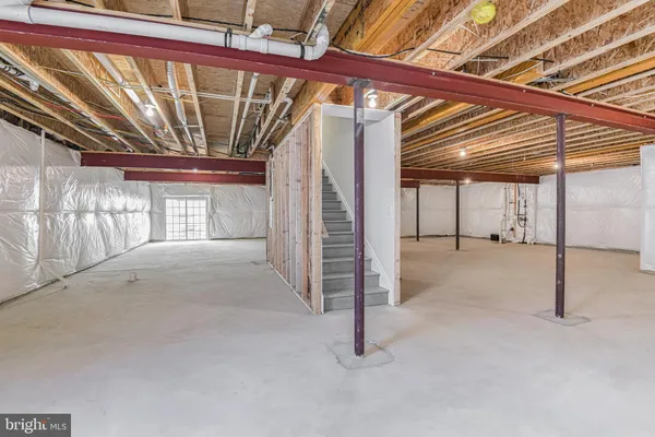 a view of a room with wooden walls