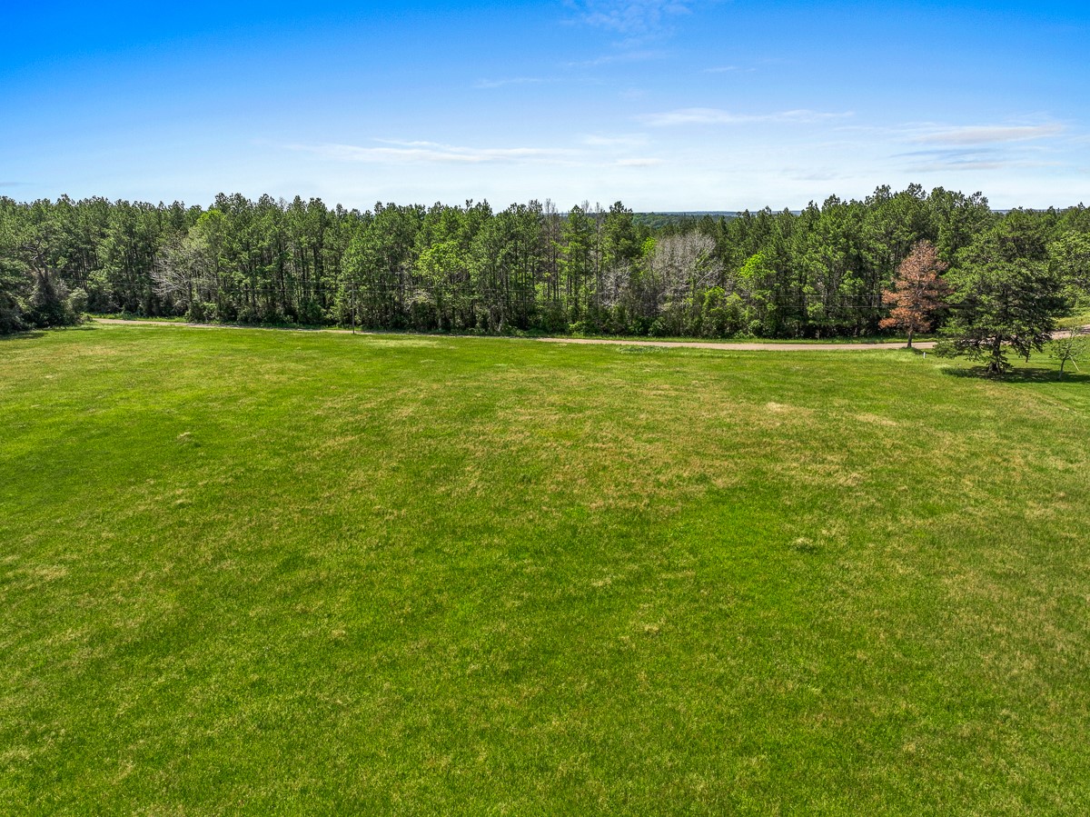 0 Sanford Road Corrigan, TX 75939 - Photo 10 of 17 a view of a green field