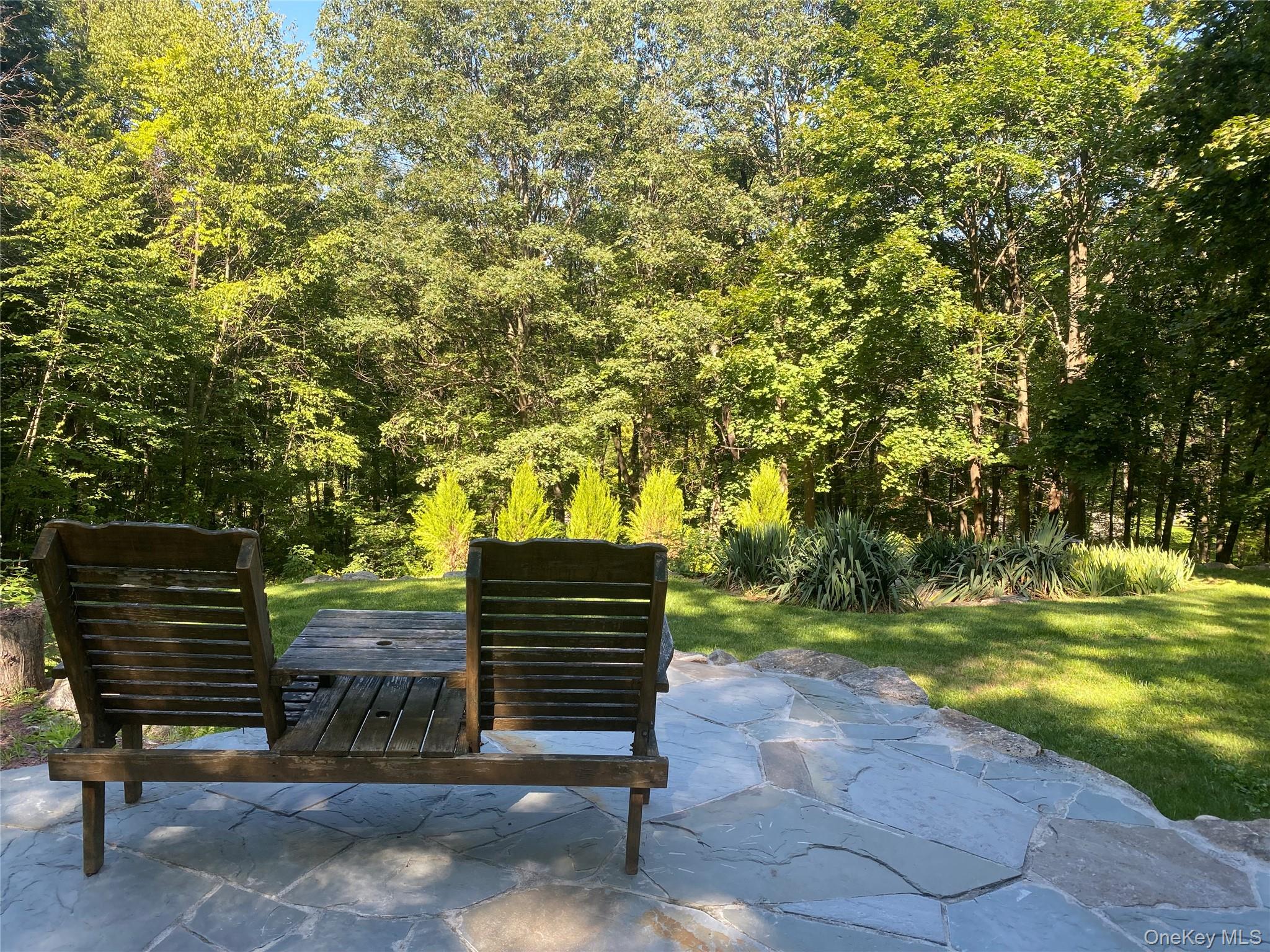 98 Travis Corners Road Garrison, NY 10524 - Photo 14 of 17 Surrounding community featuring a patio area and a yard
