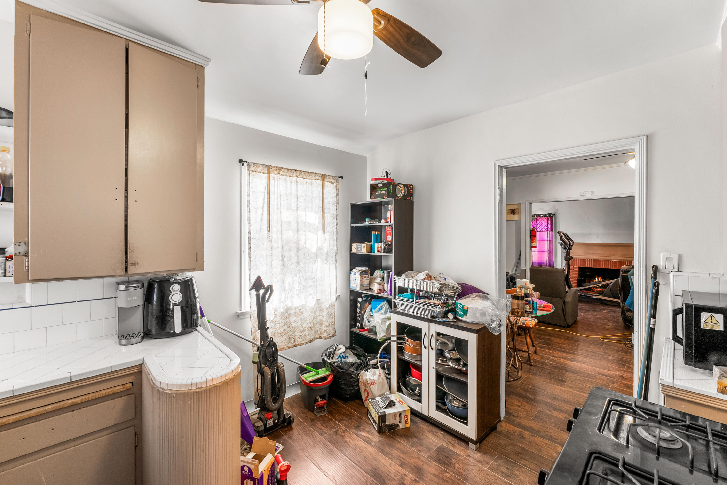 620 South Chester Avenue Compton, CA 90221 - Photo 12 of 32 a living room with furniture and a wooden floor