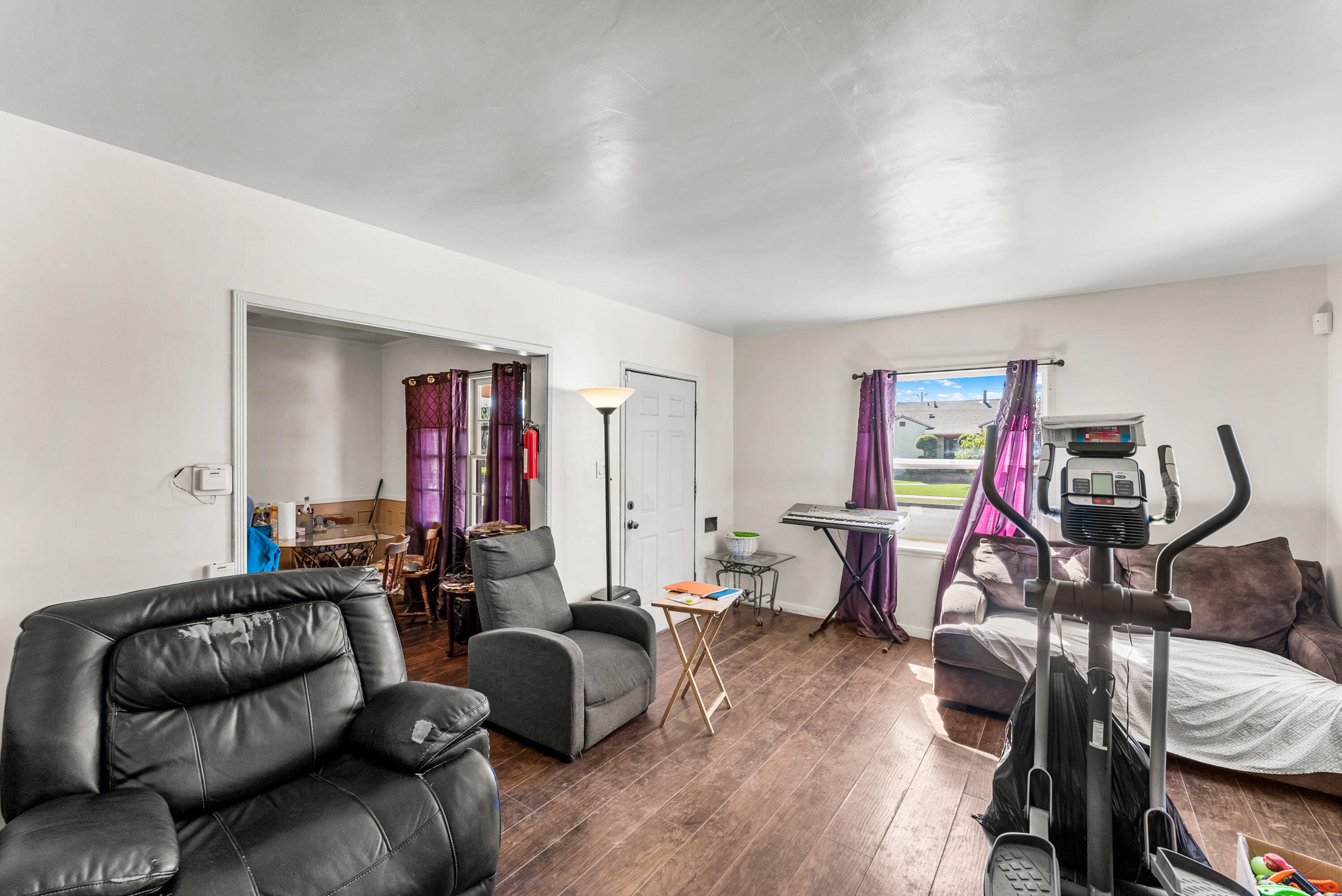 620 South Chester Avenue Compton, CA 90221 - Photo 6 of 32 a living room with furniture and a wooden floor
