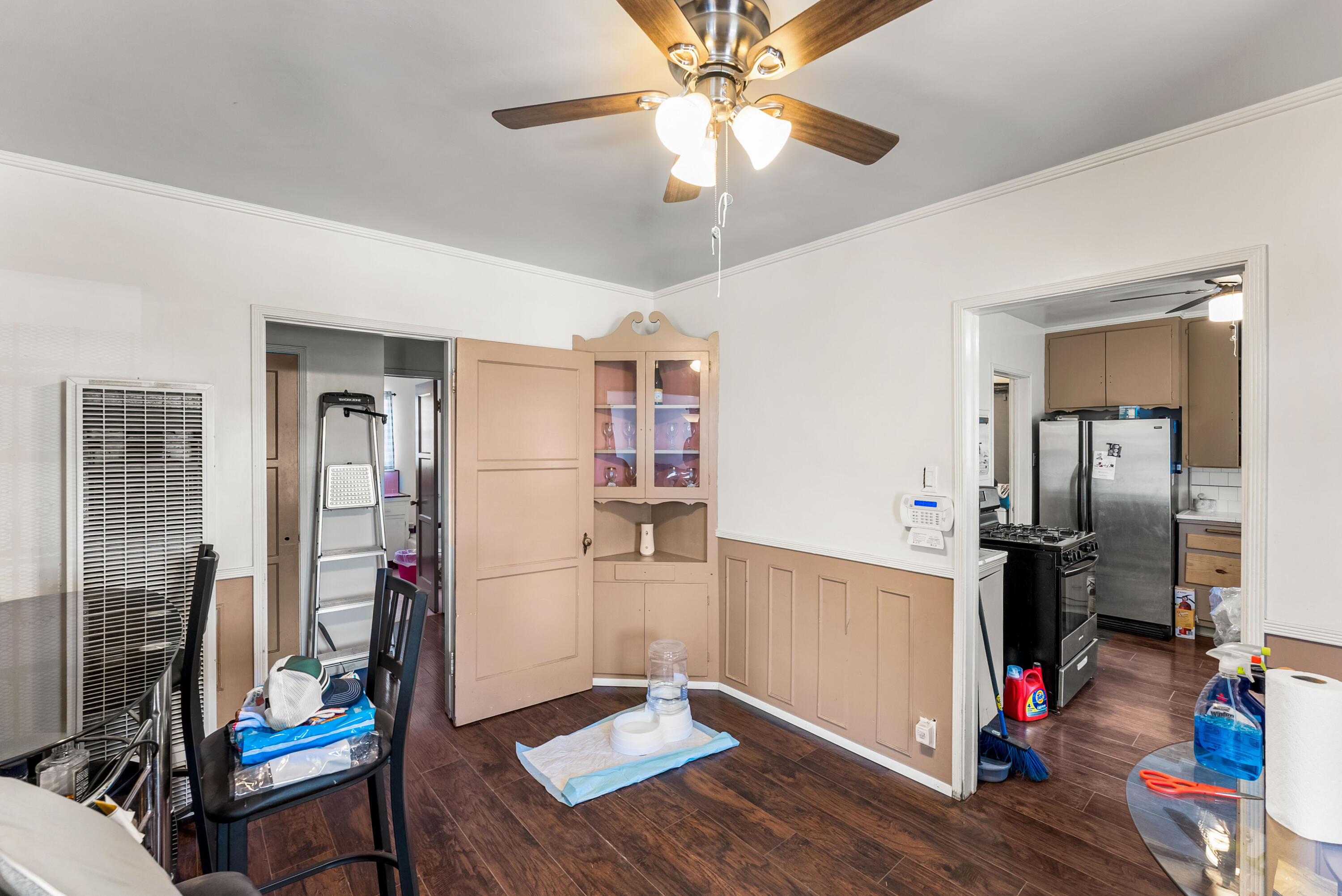 620 South Chester Avenue Compton, CA 90221 - Photo 8 of 32 a living room with furniture and wooden floor