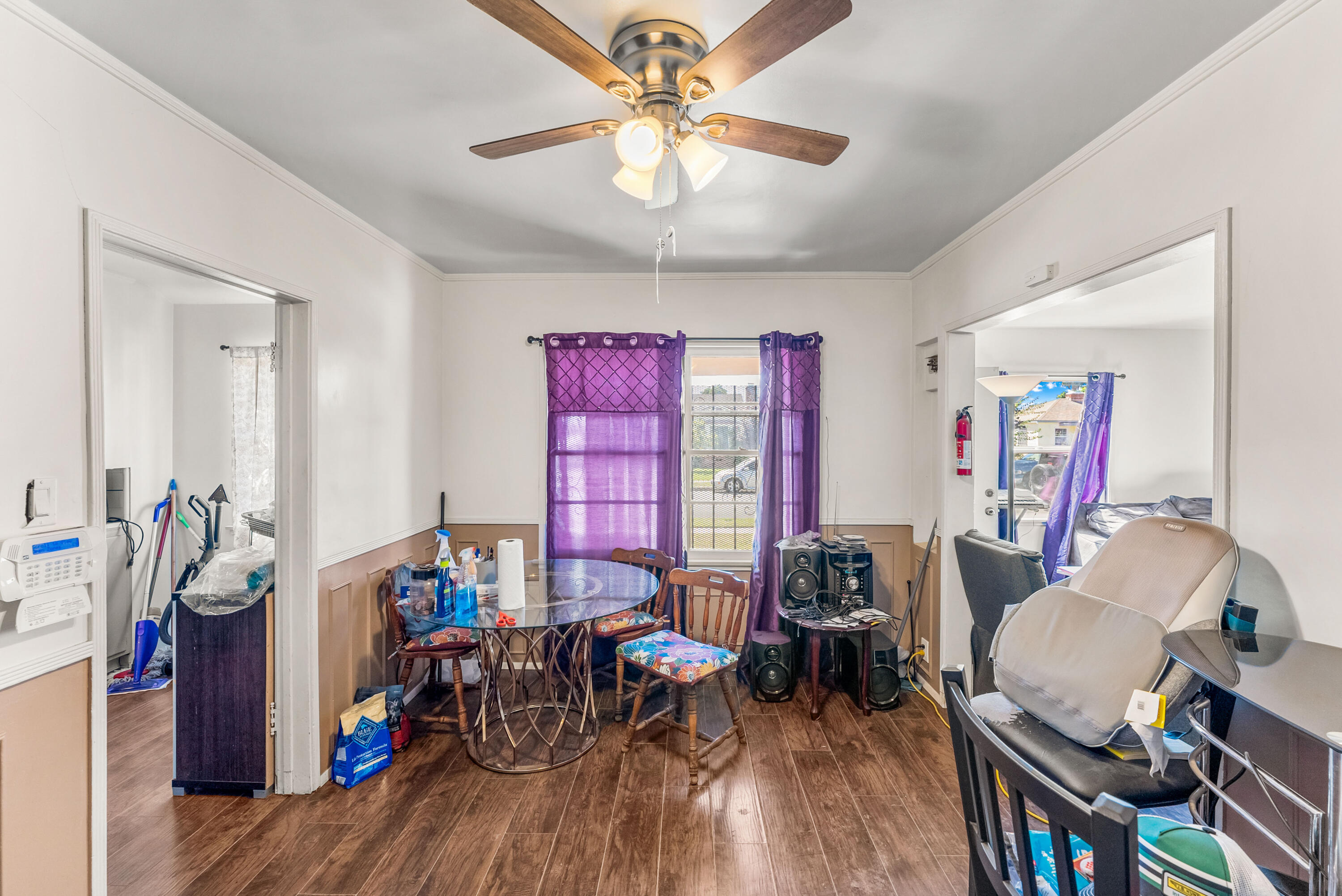 620 South Chester Avenue Compton, CA 90221 - Photo 9 of 32 a living room with furniture and a wooden floor
