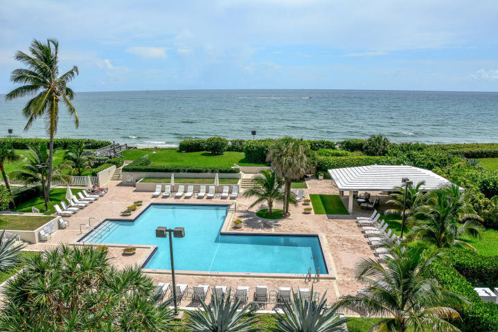 3250 South Ocean Boulevard, Unit 507N Palm Beach, FL 33480 - Photo 11 of 56 a view of a city with lawn chairs