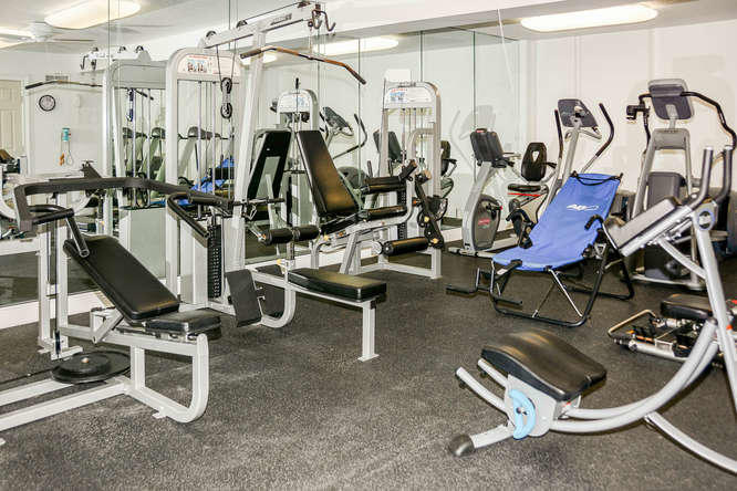 3250 South Ocean Boulevard, Unit 507N Palm Beach, FL 33480 - Photo 20 of 56 a room with gym equipment and windows