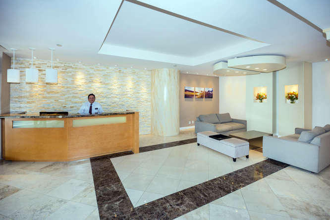 3250 South Ocean Boulevard, Unit 507N Palm Beach, FL 33480 - Photo 22 of 56 a living room with furniture and a large window