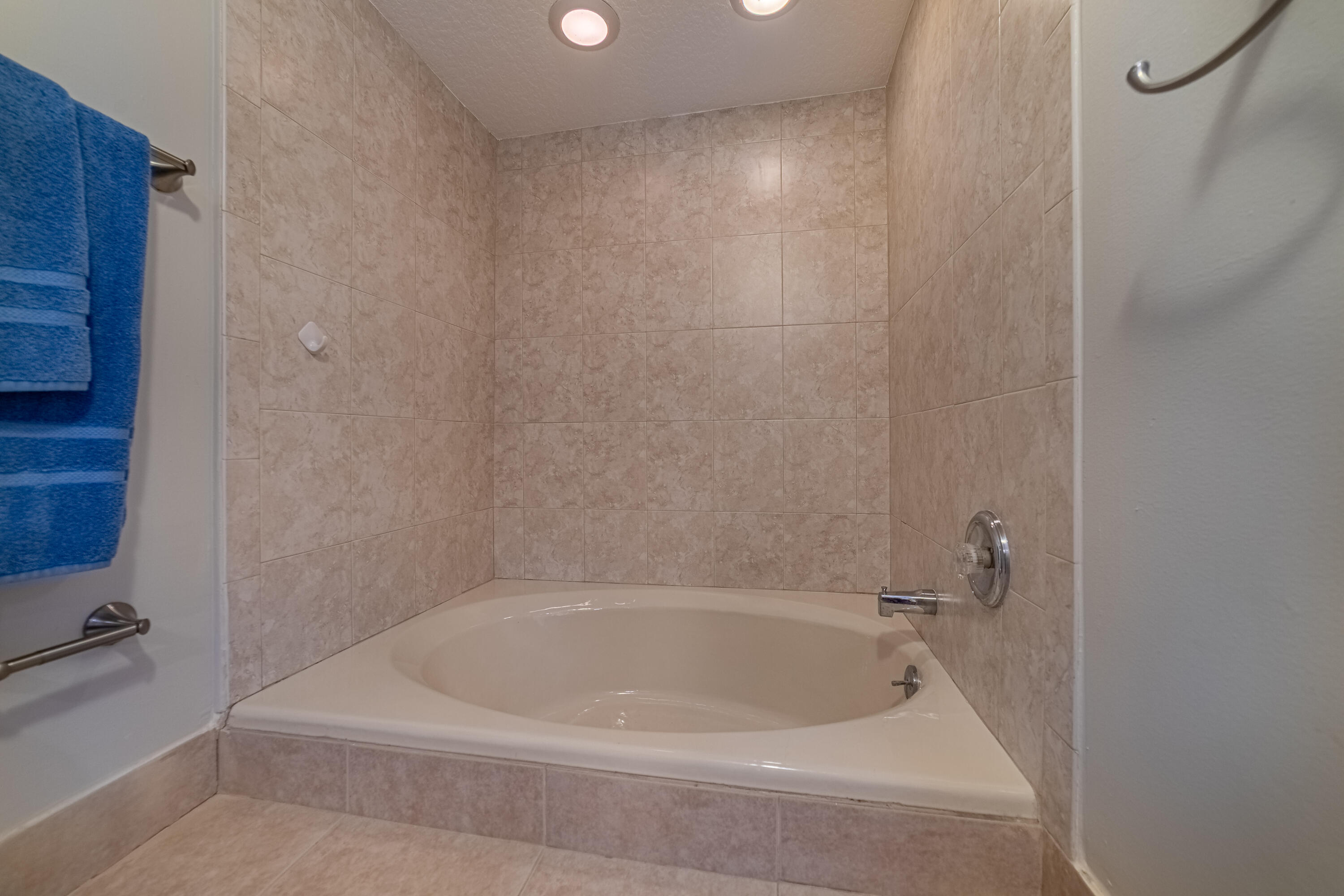 3250 South Ocean Boulevard, Unit 507N Palm Beach, FL 33480 - Photo 37 of 56 a white bath tub sitting next to a white sink