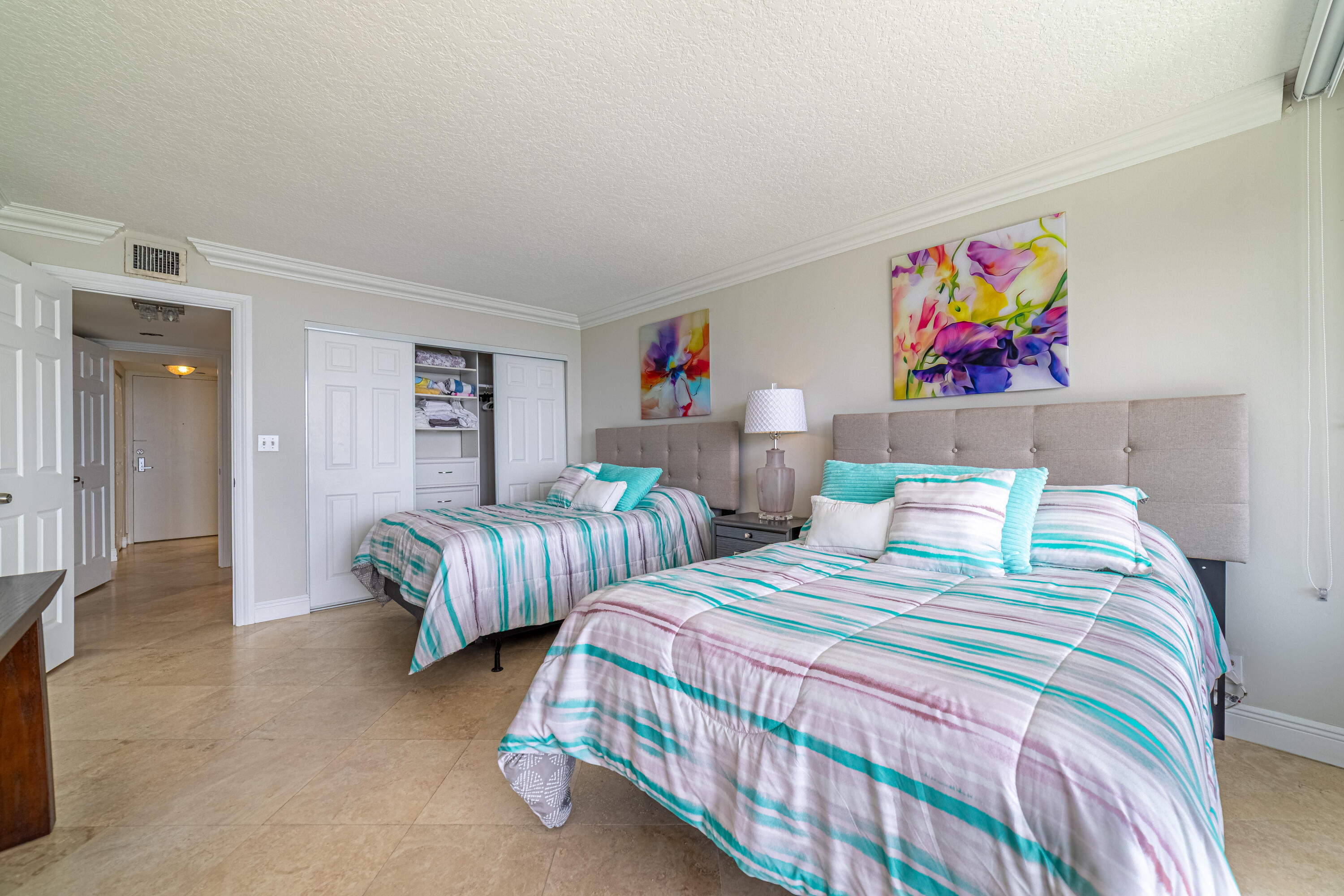 3250 South Ocean Boulevard, Unit 507N Palm Beach, FL 33480 - Photo 41 of 56 a bedroom with two beds and a couch