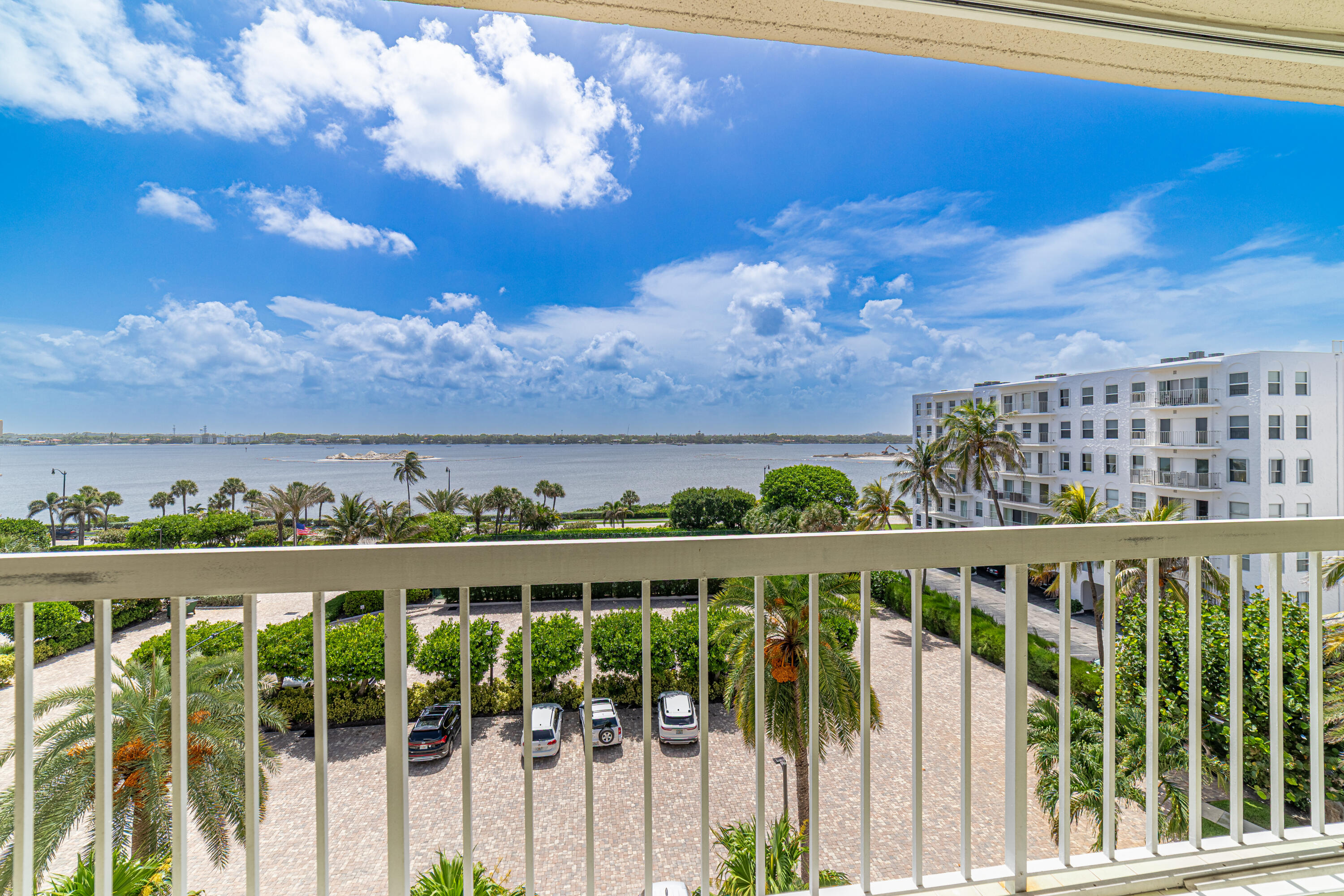 3250 South Ocean Boulevard, Unit 507N Palm Beach, FL 33480 - Photo 46 of 56 a view of a large building with a big yard