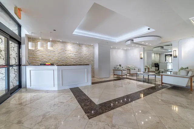 a view of a backyard with large trees