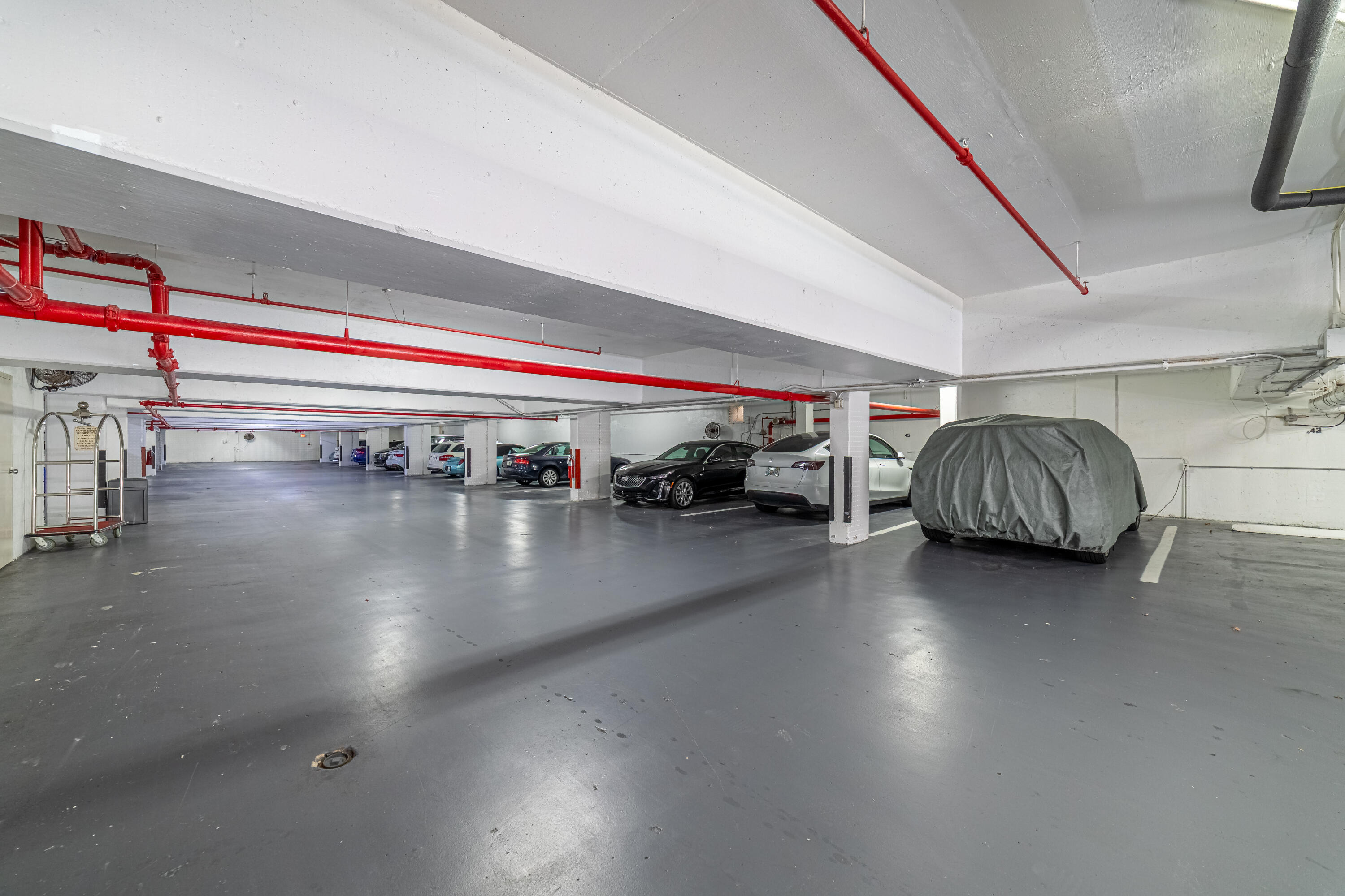 3250 South Ocean Boulevard, Unit 507N Palm Beach, FL 33480 - Photo 56 of 56 a living room with furniture and a floor to ceiling window