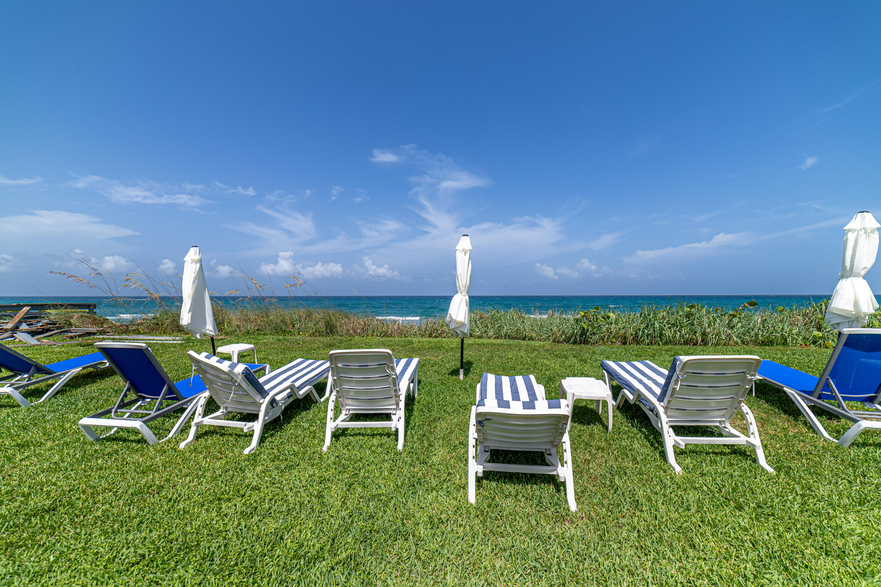 3250 South Ocean Boulevard, Unit 507N Palm Beach, FL 33480 - Photo 7 of 56 a patio with table and chairs