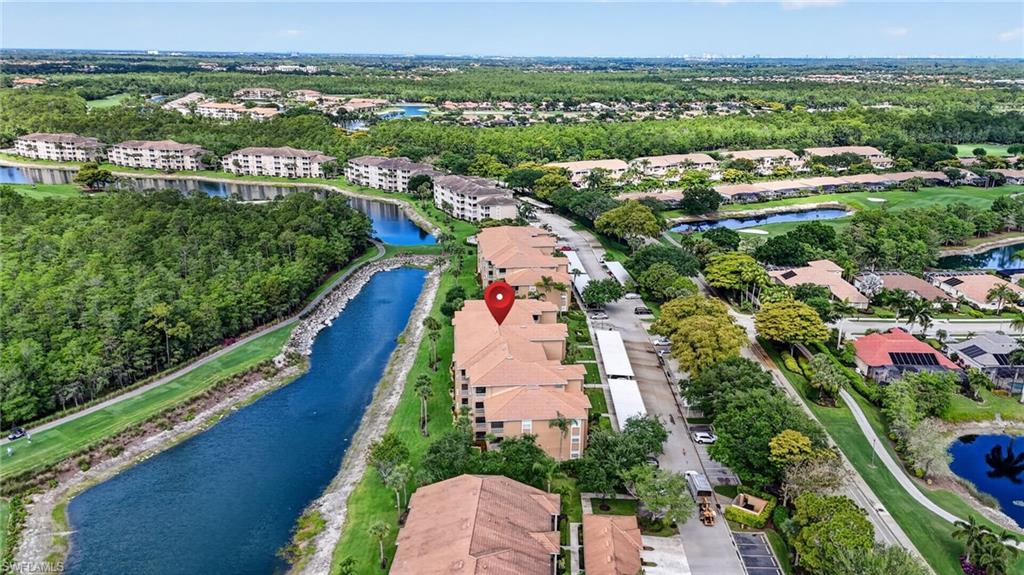 3830 Sawgrass Way, Unit 2922 Naples, FL 34112 - Photo 11 of 43 an aerial view of residential houses with outdoor space and street view
