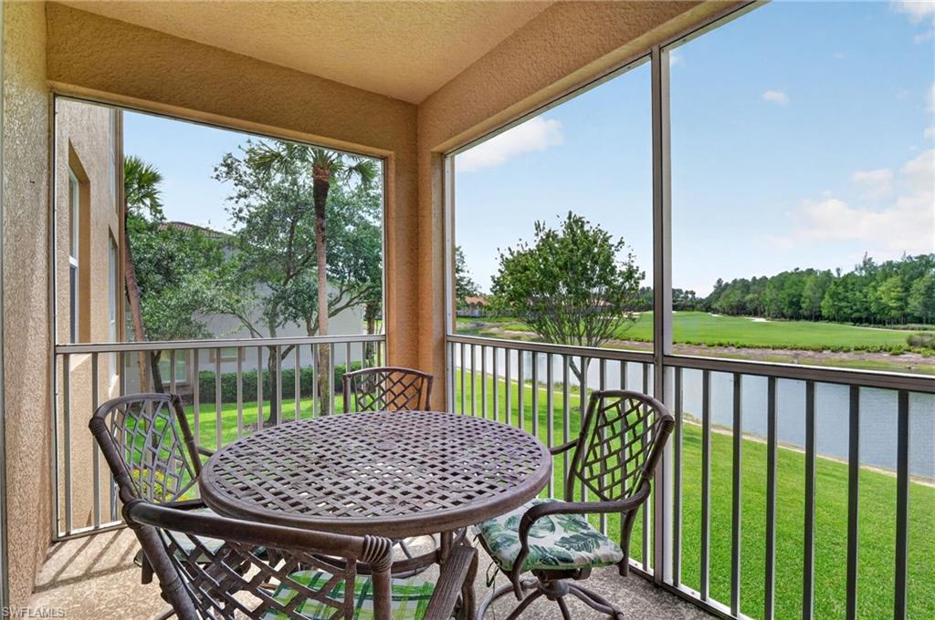 3830 Sawgrass Way, Unit 2922 Naples, FL 34112 - Photo 2 of 43 a view of balcony with furniture