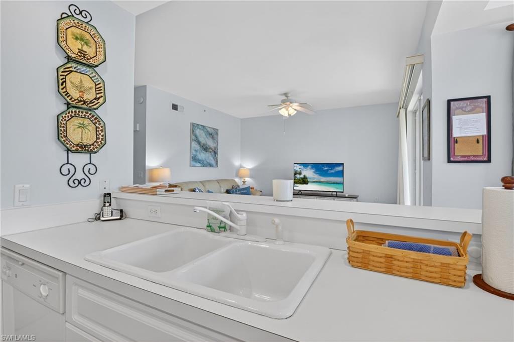 3830 Sawgrass Way, Unit 2922 Naples, FL 34112 - Photo 30 of 43 a bathroom with a sink and a bathtub