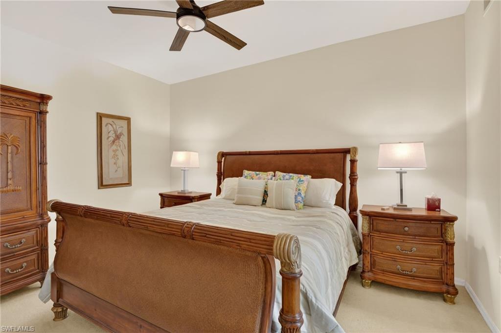 3830 Sawgrass Way, Unit 2922 Naples, FL 34112 - Photo 33 of 43 a bedroom with a bed and window