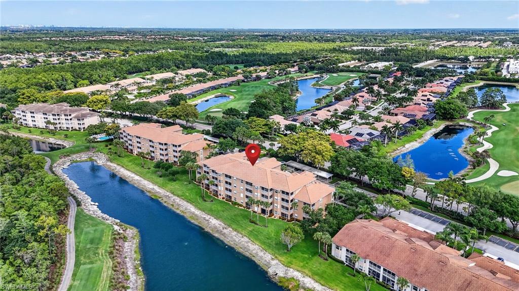 3830 Sawgrass Way, Unit 2922 Naples, FL 34112 - Photo 10 of 43 an aerial view of residential houses with outdoor space