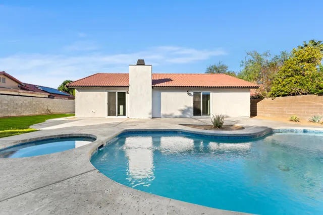 swimming pool view with a outdoor space