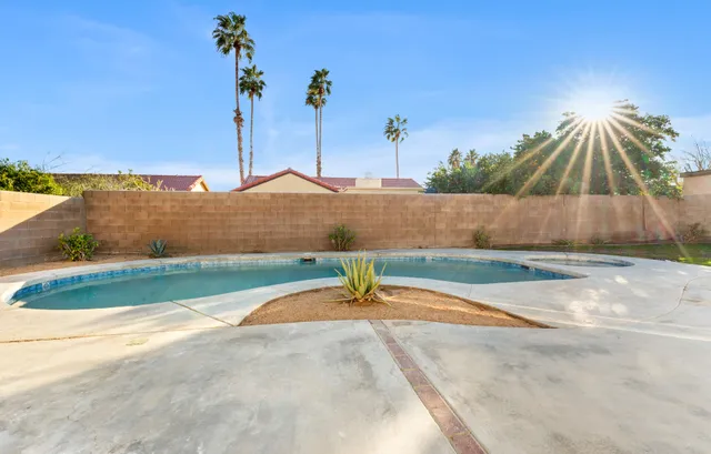 a view of potted plant in front of a building