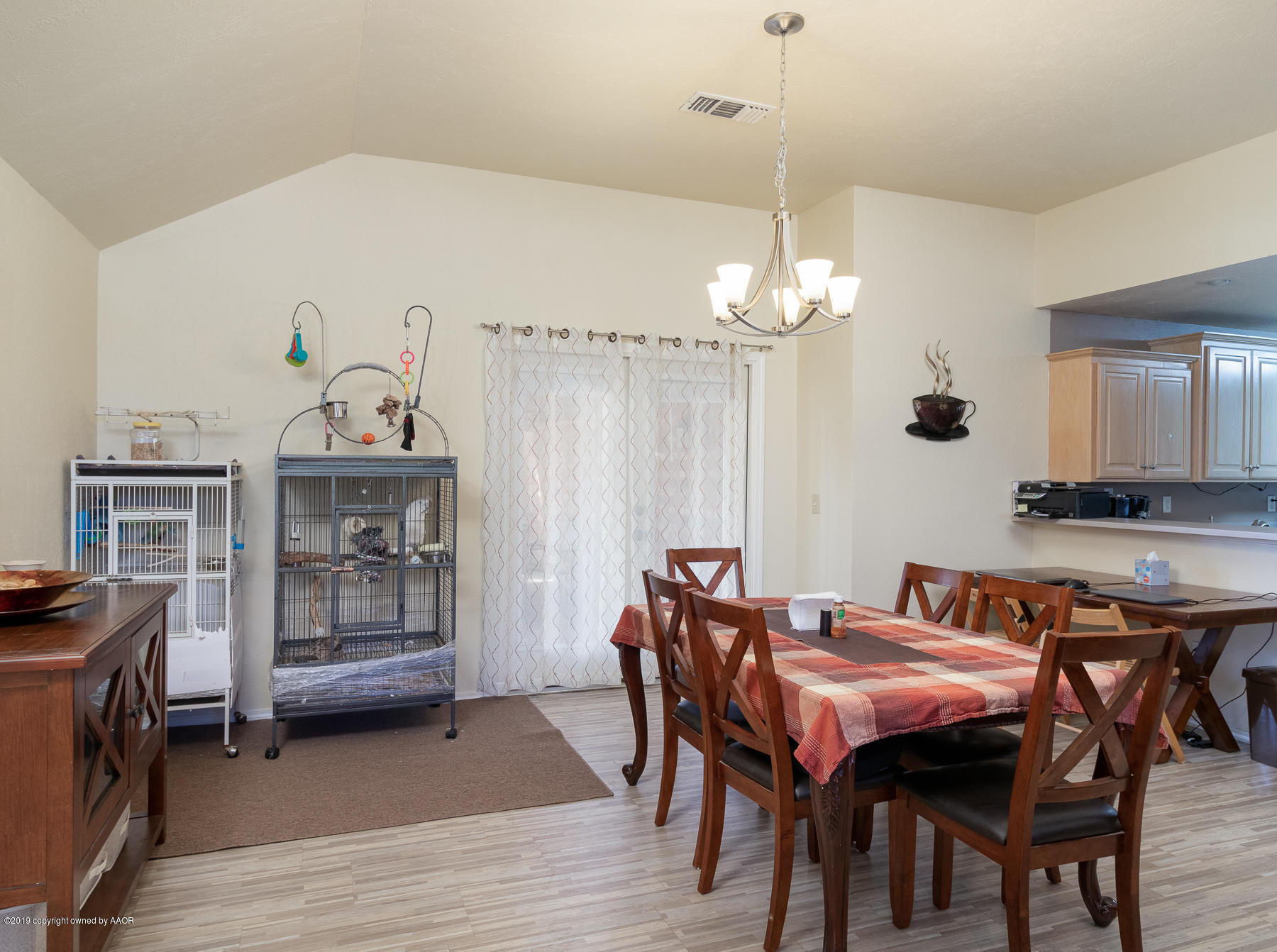 6403 Rally Road Amarillo, TX 79119 - Photo 8 of 24 a dining room with furniture and window