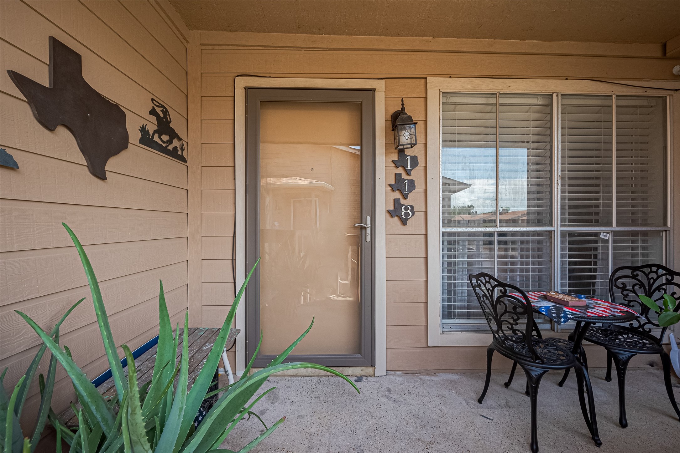 1505 Ward Road, Unit 118 Baytown, TX 77520 - Photo 3 of 35 Charming exterior with a welcoming courtyard.