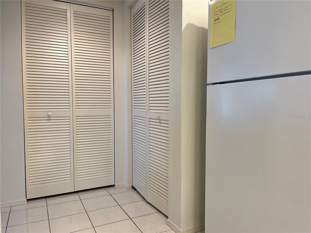 1397 Perico Point Circle, Unit 1397 Bradenton, FL 34209 - Photo 13 of 39 a view of a refrigerator in an empty room