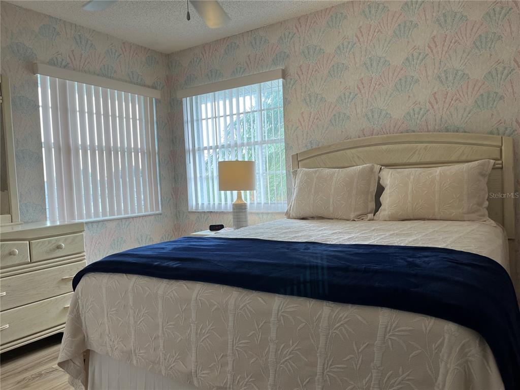 1397 Perico Point Circle, Unit 1397 Bradenton, FL 34209 - Photo 18 of 39 a bedroom with a bed and window