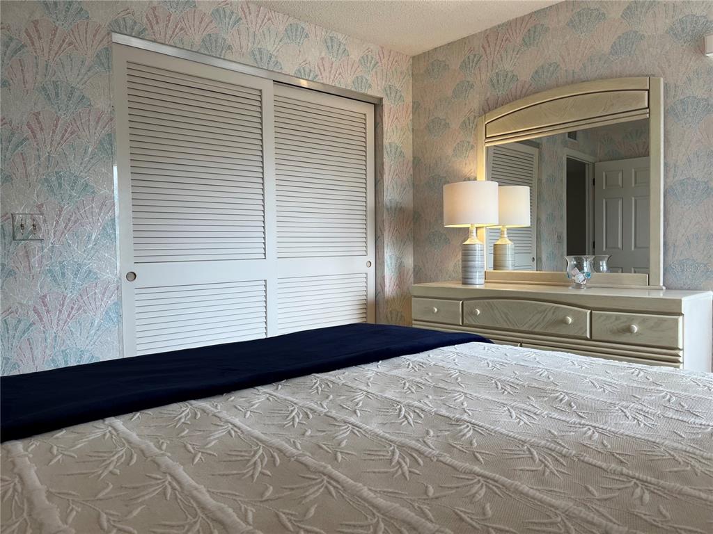 1397 Perico Point Circle, Unit 1397 Bradenton, FL 34209 - Photo 19 of 39 a bedroom with a large bed and a window