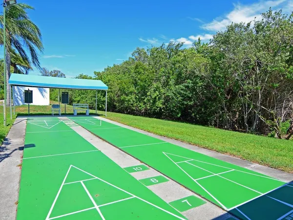 a view of an outdoor space and tennis court