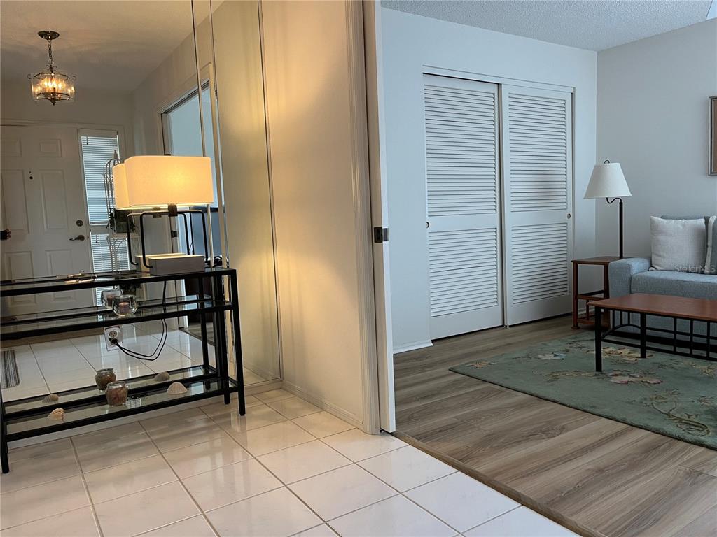 1397 Perico Point Circle, Unit 1397 Bradenton, FL 34209 - Photo 8 of 39 a view of a livingroom with furniture and a dresser