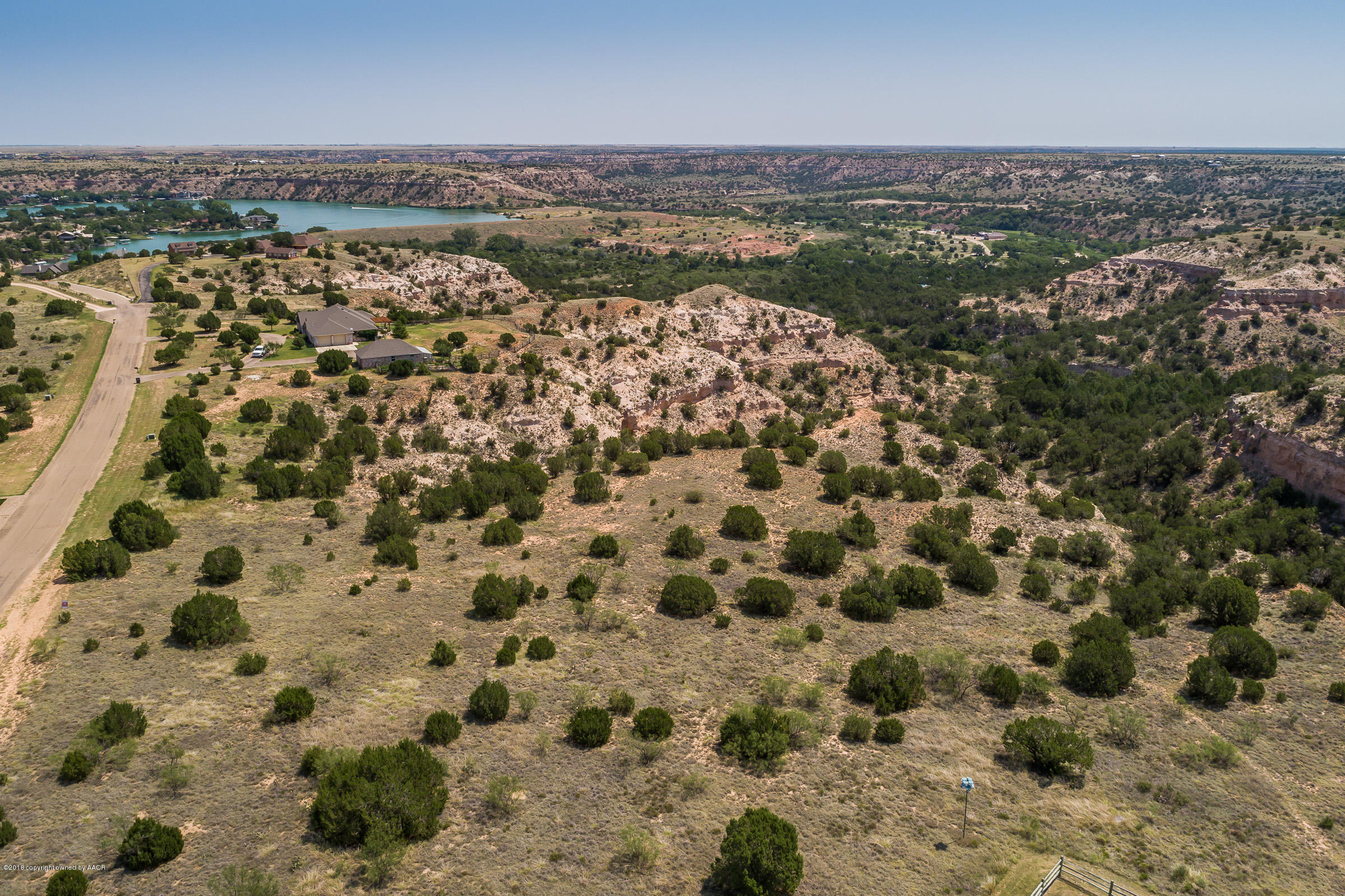 313 Lake Ridge Road Canyon, TX 79015 - Photo 1 of 2 an aerial view of a city