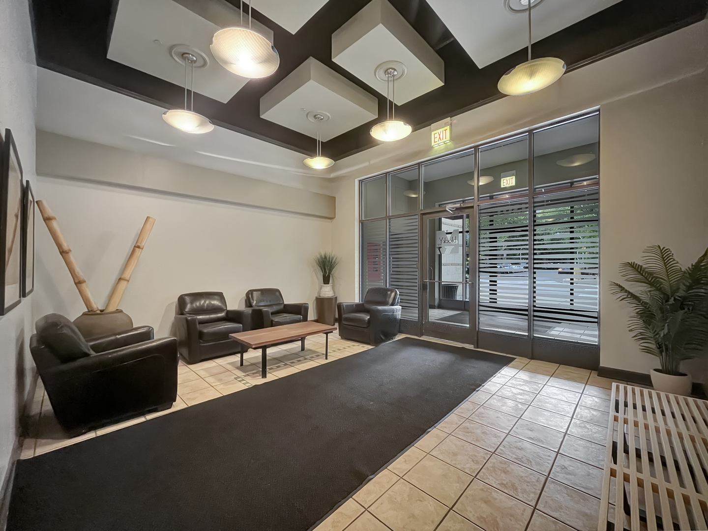 1301 West Madison Street, Unit 201 Chicago, IL 60607 - Photo 14 of 14 a living room with furniture